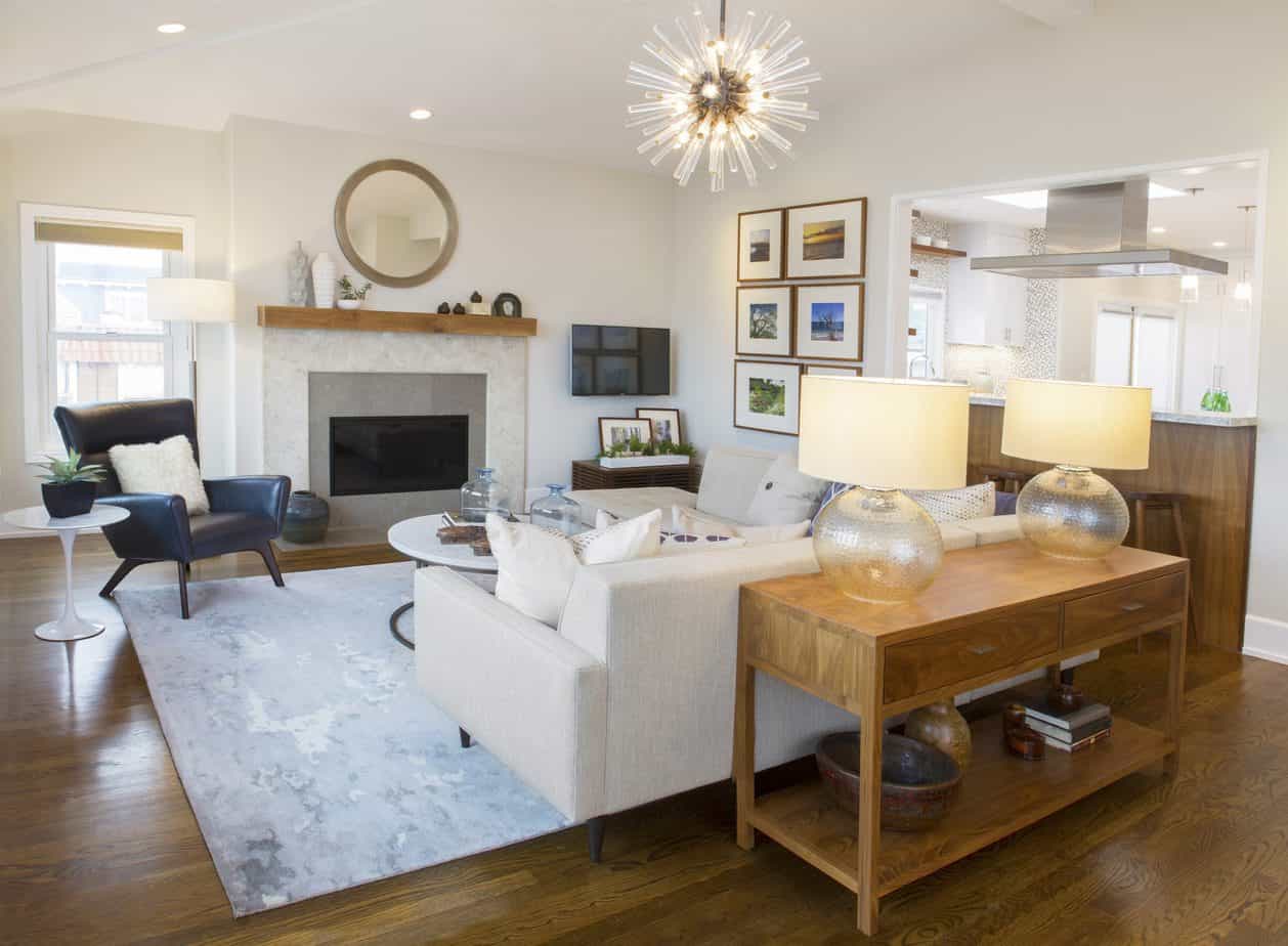 Redondo Beach Interior Designers modern coastal style living room with blue side chair and white sofa facing fireplace