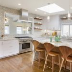 Modern Coastal interior designer Redondo Beach CA bright airy white kitchen with grey counter-tops and iridescent tile back-splash